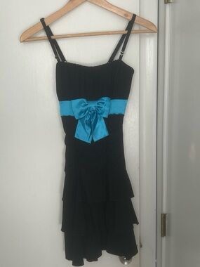 Vintage black tiered mini dress with turquoise satin bow